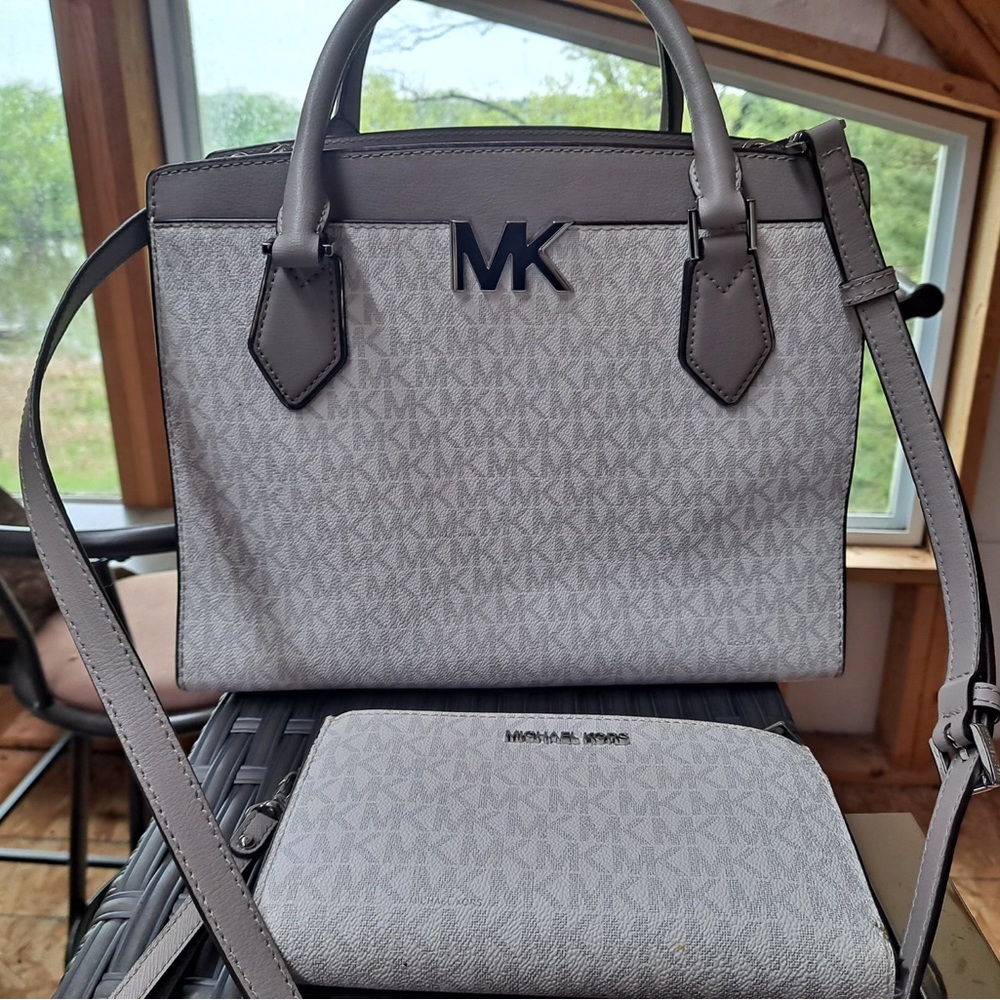Micheal Kors shoulder bag with long strap.